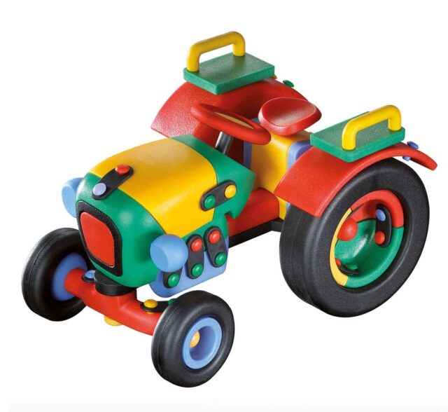 MIC-089.071 MIC-O-MIC. Large tractor(colorful) - Design and craftsmanship are combined with an educational and training concept. A learning process takes place through the construction of various models, particularly fostering the fine motor skills and three-dimensional imagination of the children. The child will be proud when he/she has completed the construction of the model. It is a learning process that will encourage the child to progress to the next level. In addition, parents and children can spend many hours playing together - and perhaps even compete with each other as the child becomes more skilled! Mic-o-mic meets today's spirit of education through play, filling any children who engage with them with excitement and joy!                                                                                                                                                                                 Material: Coloured plastic                                                                                                                                                                                                                     Dimensions: 10,6 x 14,3 x 8,6 cm                                                                                                                                                                                                       Packaging dimensions: 33,5 x 29 x 8,5cm.