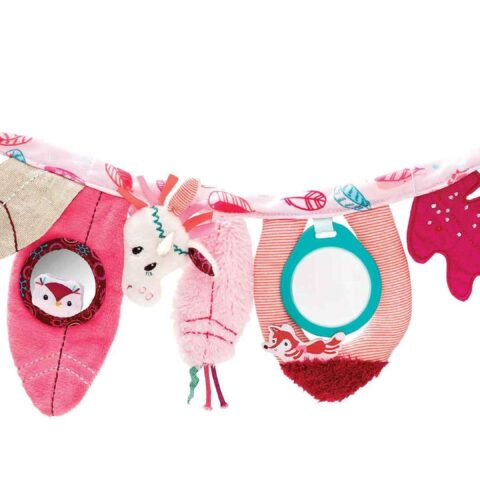 LI83018 LILLIPUTIENS- Fabric hanging toy Louise on a walk - Have fun on-the-go with this Louise the Unicorn activity toy. Simply attach to your baby's pram and watch them become entranced by the stimulating shapes, objects and sounds.