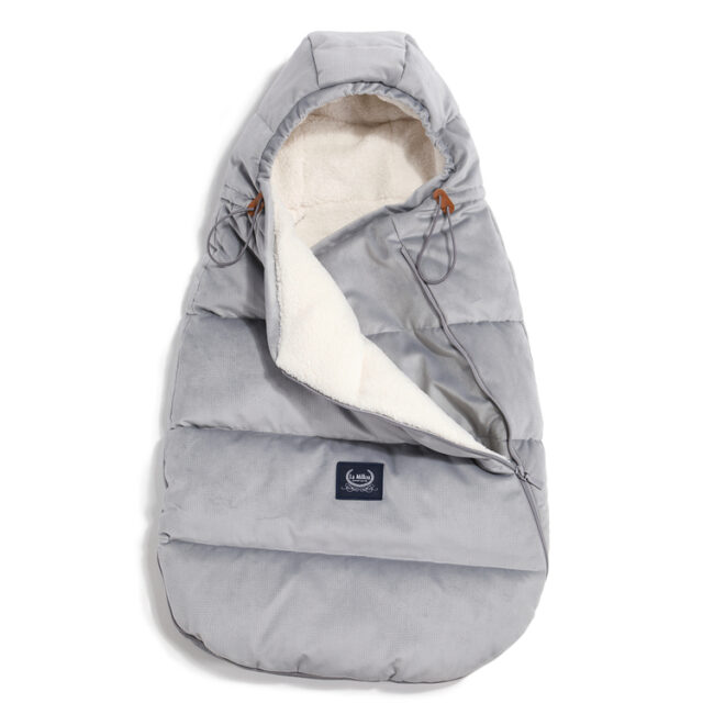 The inside of the footmuff is made of warm and soft fur , which has a safety certificate - OEKO-TEX