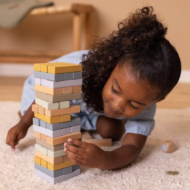 Wooden tower game - How tall can you stack a tower of colorful wooden blocks until it falls? This Little Dutch wooden stacking blocks game makes for a great activity that the whole family will love. The game improves your child’s hand-to-eye coordination and increases his or her fine motor skills. First, you build a tower by stacking all the blocks. Each player then removes one block at a time and places it on top of the tower. But, be careful! If you’re knocking over the tower, the game is over. Roll the dice to make it extra challenging and even more fun. The color that appears shows you what block to remove. Lots of laughs guaranteed.