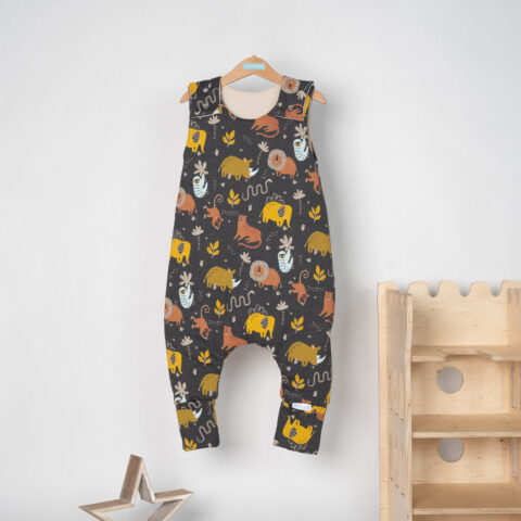 Gray melange sleeping bag with orange lions and various animals such as elephants, rhinos, etc.