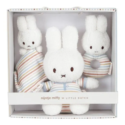 box of soft bunnies in striped clothes