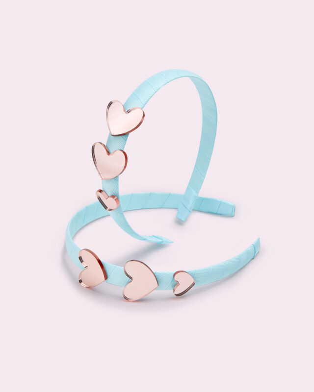 soft hairband with 3 plexi hearts in pink